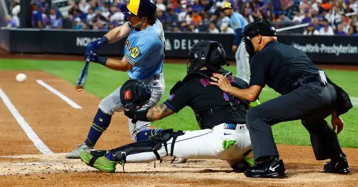 Brewers overcome Dustin May's early injury to rout the Mets 8-1