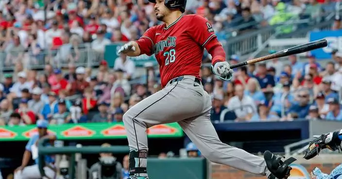 Arizona third baseman Arenado leaves game against the Braves with left trunk discomfort