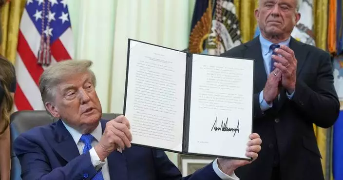 FACT FOCUS:  Trump makes false claims as he signs order urging revisions around childhood vaccines