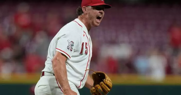 McLain homers to back Lowder in the Reds' 3-2 victory over the A's