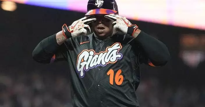 Rafael Devers bounces a homer into McCovey Cove as Giants beat Reds 3-1