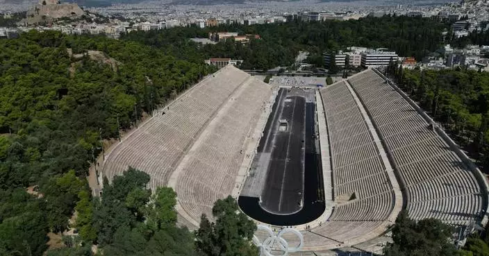 Athens is cleaning its all-marble Olympic stadium for the first time in more than a century