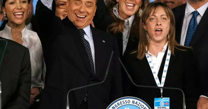 From black boots to pastel suits, Italian premier's wardrobe evolves with her politics