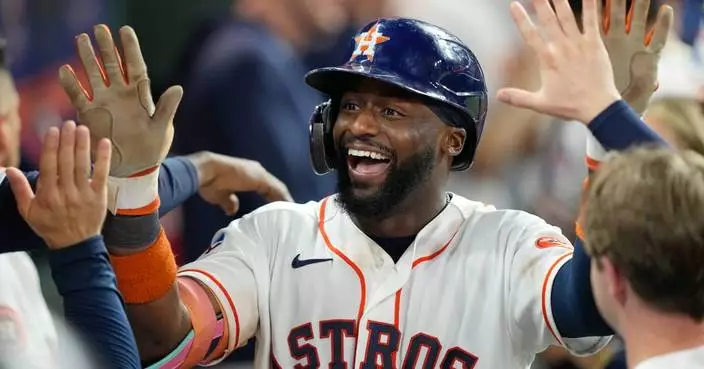 Tremmell homers and Altuve has 2 RBIs in the Astros' 7-2 win over the Blue Jays