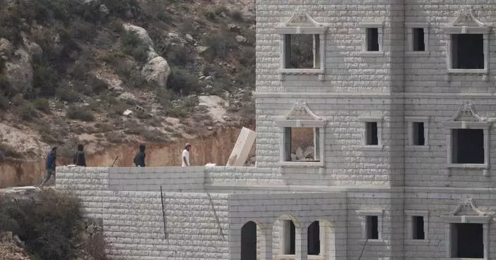 Iran's leader calls for Muslim unity, NBC crew attacked in West Bank and other Mideast news