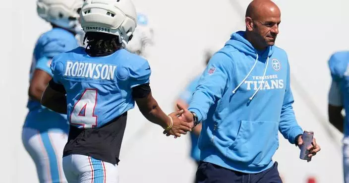 Titans coach calls hit by Bears safety Xavier Woods on Wan'Dale Robinson in joint practice 'cheap'