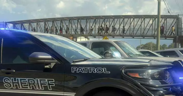 Student wounded and young suspect is in custody after shooting at Georgia high school, police say