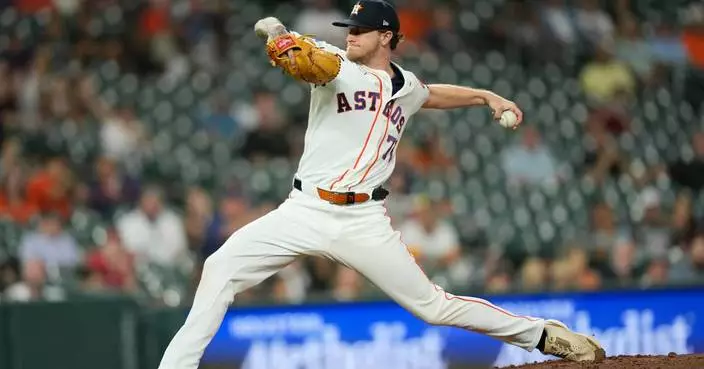Pecko fans 4 in MLB debut, Vázquez hits 7th homer as the Astros beat the Angels 3-2