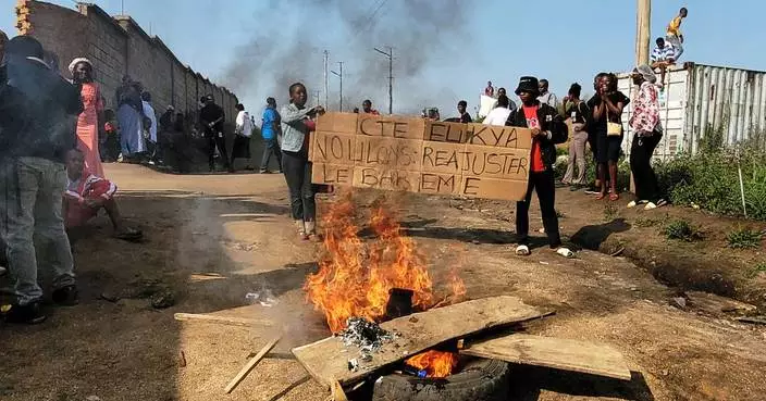 WHO chief visits Congo to support Ebola efforts as some workers strike over pay