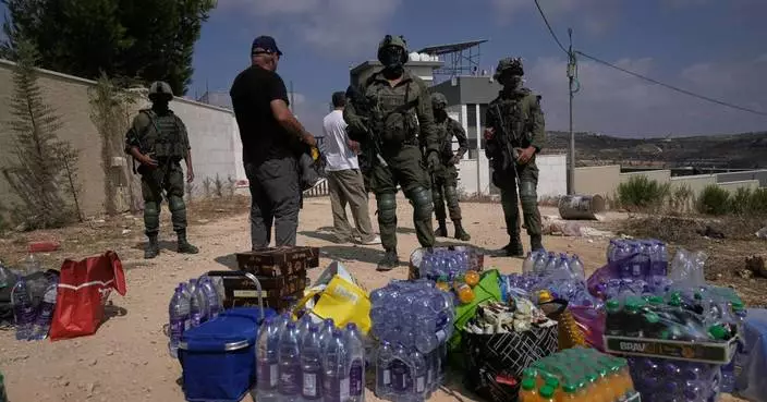 Palestinians besieged in West Bank village fear Israeli settlers will seize their homes