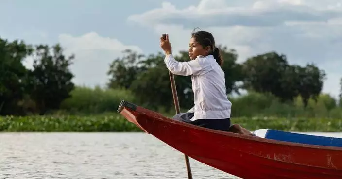 Photos show Cambodian children attend school in floating villages along the Tonle Sap lake