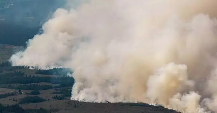Firefighters battle a massive Belgian wildfire, forcing hundreds to evacuate