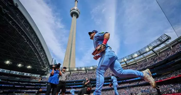 Astros add center fielder Daulton Varsho from Toronto for righty Spencer Arrighetti