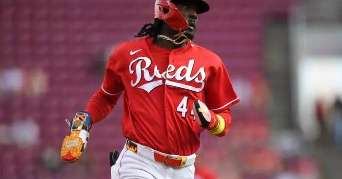 De La Cruz's 1st career walk-off hit in 10th gives Reds 6-5 win over Cardinals to split doubleheader