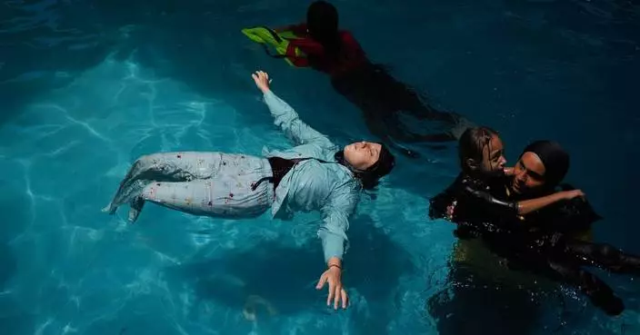 Palestinian children who lost limbs in the Israel-Hamas war learn to swim in Gaza