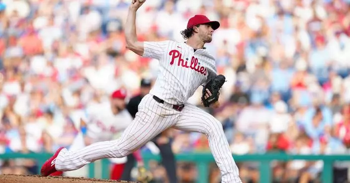 Phillies' Aaron Nola exits with right knee contusion in sixth inning against Toronto