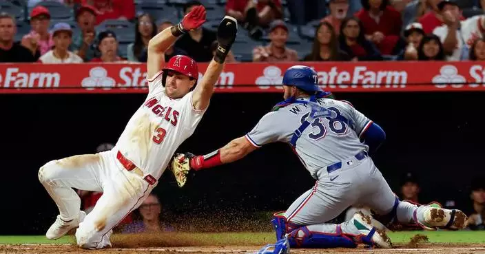 Ureña pitches Angels past Rangers 7-0 as Trout and Guzman lead offense with 3 hits apiece