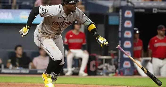 Perdomo, Carroll homer in 7-run 7th in Diamondbacks' 12-8 win over the Guardians