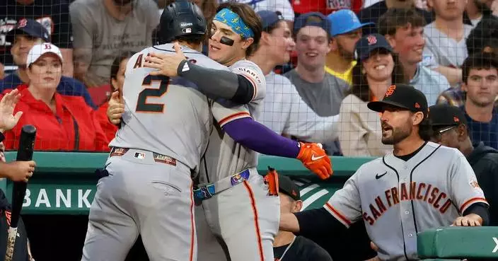 Eli White slides home headfirst with winning run, play reviewed and Red Sox rally past Giants 3-2