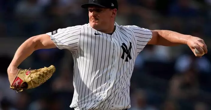 Cole, Yankees hold off Braves 5-4 in matchup of Cy Young winners