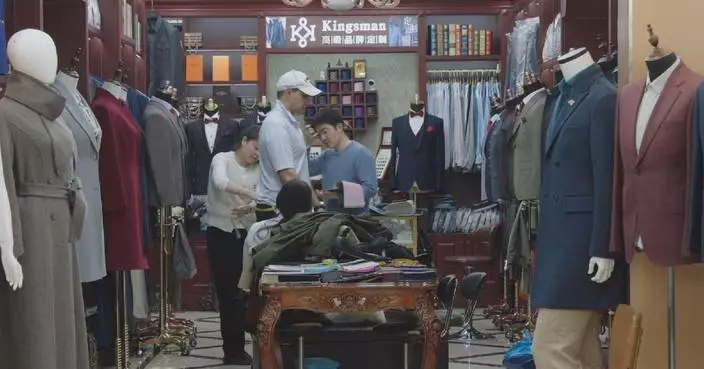 Custom clothing market in Shanghai attracts increasing int'l travelers