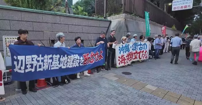 Japanese protesters oppose Henoko base, constitutional revision