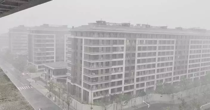 Heavy rain drenches Beijing