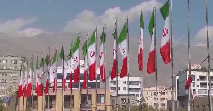Iran's president says Tehran favors dialogue, but won't be forced to surrender