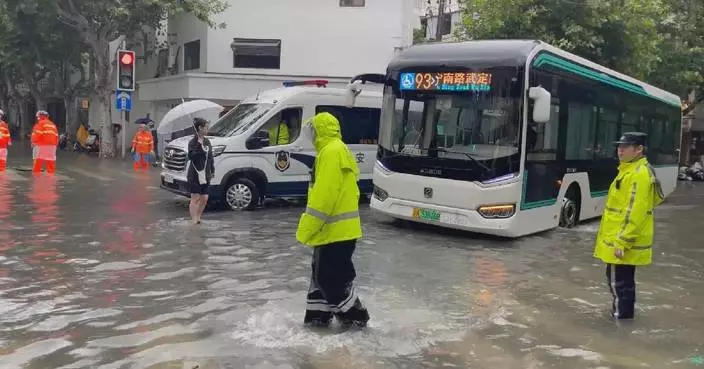 Shanghai hit by torrential rains, flooding from Typhoon Dolphin