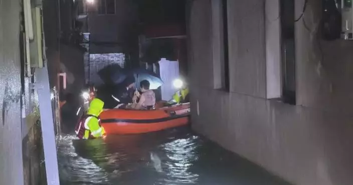 Firefighters rescue trapped people as Typhoon Dolphin batters coastal Zhejiang