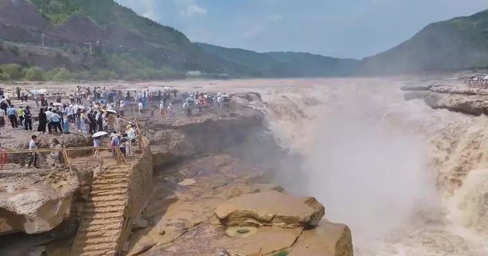 Hukou Waterfall draws summer crowds as service upgrades pay off