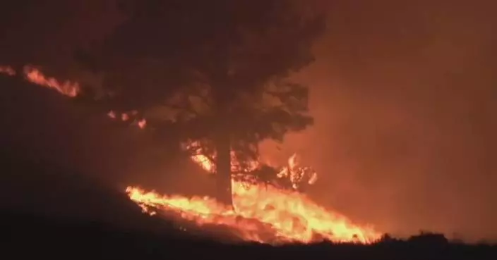 Deadly wildfires force 20,000 Canadians to flee as flames sweep across British Columbia