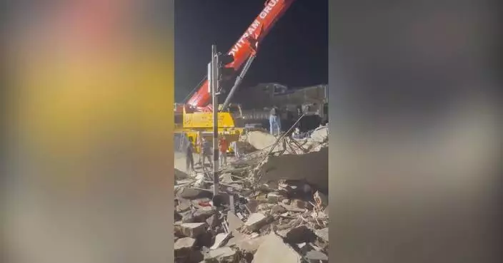 Rescuers scramble to find survivors from collapsed building after Colombia quake