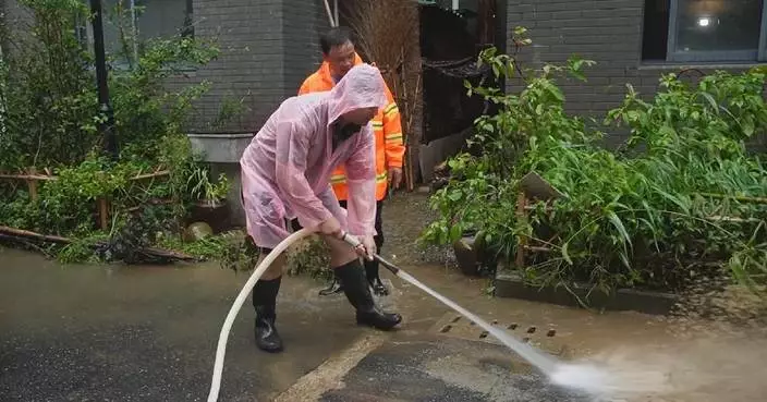 Village officials take lead in disaster relief after typhoon-triggered flood