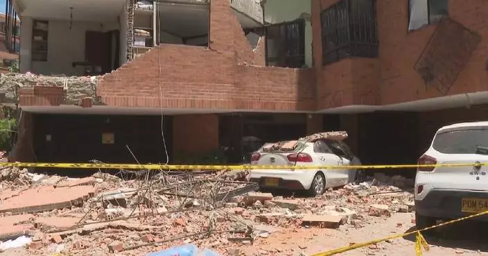 Colombian firefighter recalls urgent rescue of mother and son from collapsed building after quake
