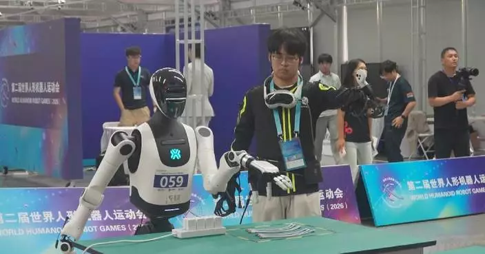 Robots show off dexterity in cable connection challenge for 2nd World Humanoid Robot Games