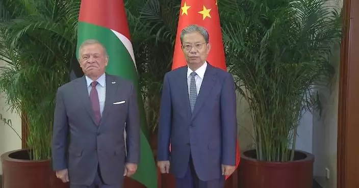 China's top legislator meets Jordan's king in Beijing