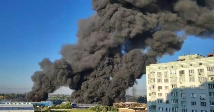 Drone strike sparks massive fire at warehouses in Kiev's suburb