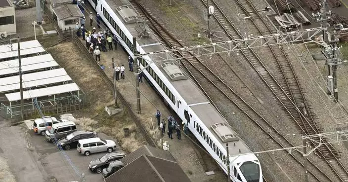 Express train hits and kills 4 workers at a railway station in Japan