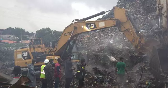A landslide at a landfill in the capital of Guinea kills 30 people, officials say