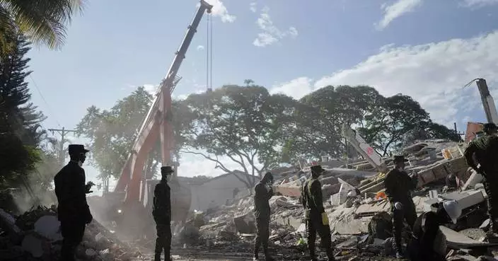 Rescuers call for silence around earthquake rubble as window for survival narrows in Colombia