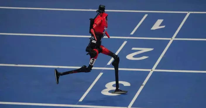 Humanoid robots sprint, play soccer and set records at Beijing games, in photos