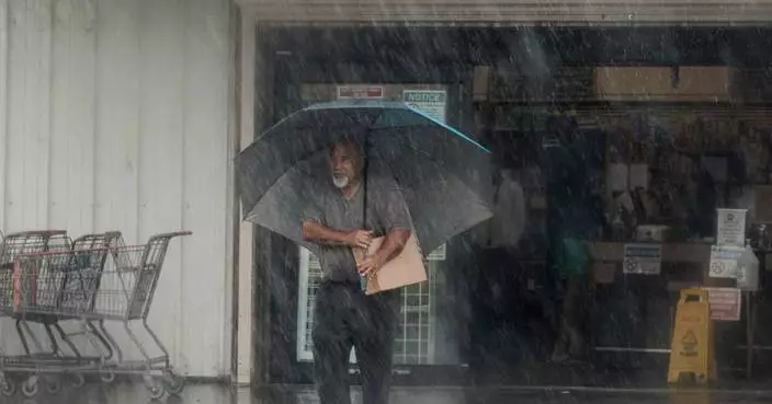 Lala is again a tropical storm, sending drenching rain and winds across the Hawaiian islands