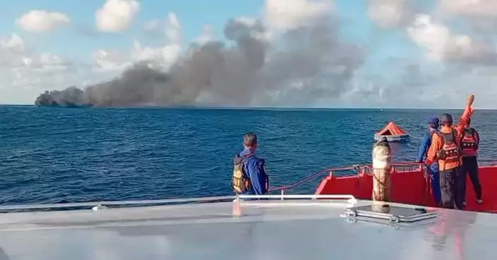 Crews work to rescue more passengers from burning ferry near Bali, Indonesia