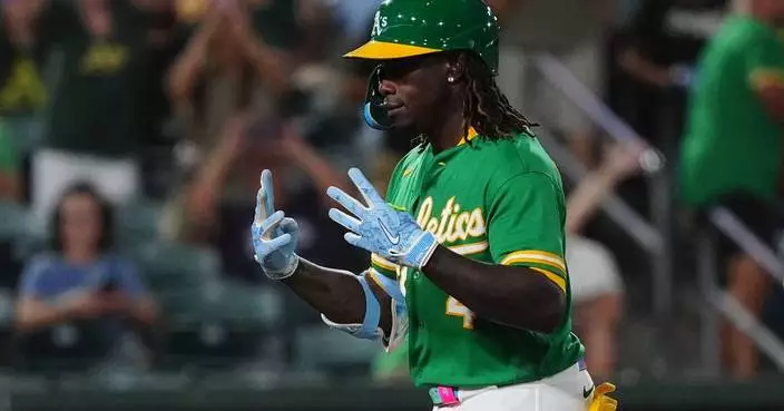 Butler homers and Williams hits a 2-run triple as the Athletics beat the Twins 7-4