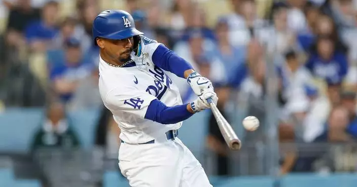 Max Muncy’s 10th-inning single lifts the Dodgers past the Royals 5-4