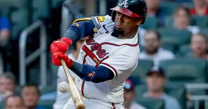 Albies drives in winning run in the 8th, Braves win 4-3 to snap Dodgers' 6-game winning streak