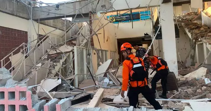 Rescuers dig through rubble and landslides after Indonesia quake kills 47
