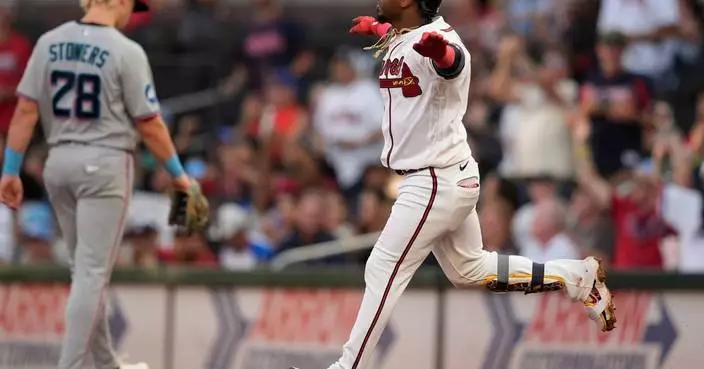 Albies and Riley homer, Braves beat Marlins 4-2 behind Grant Holmes’ 6 scoreless innings