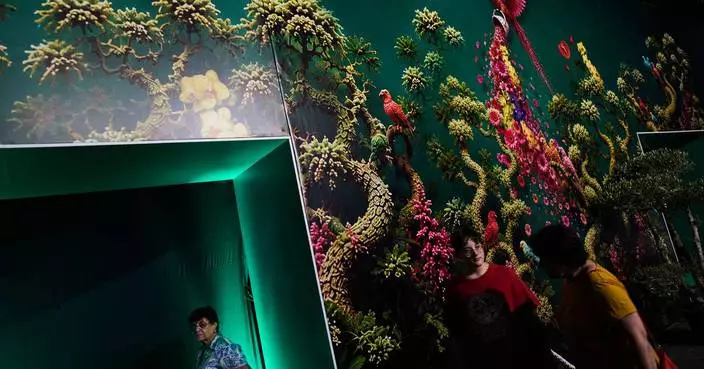 Flowers create elaborate fantasy worlds at a Tel Aviv exhibition, in photos